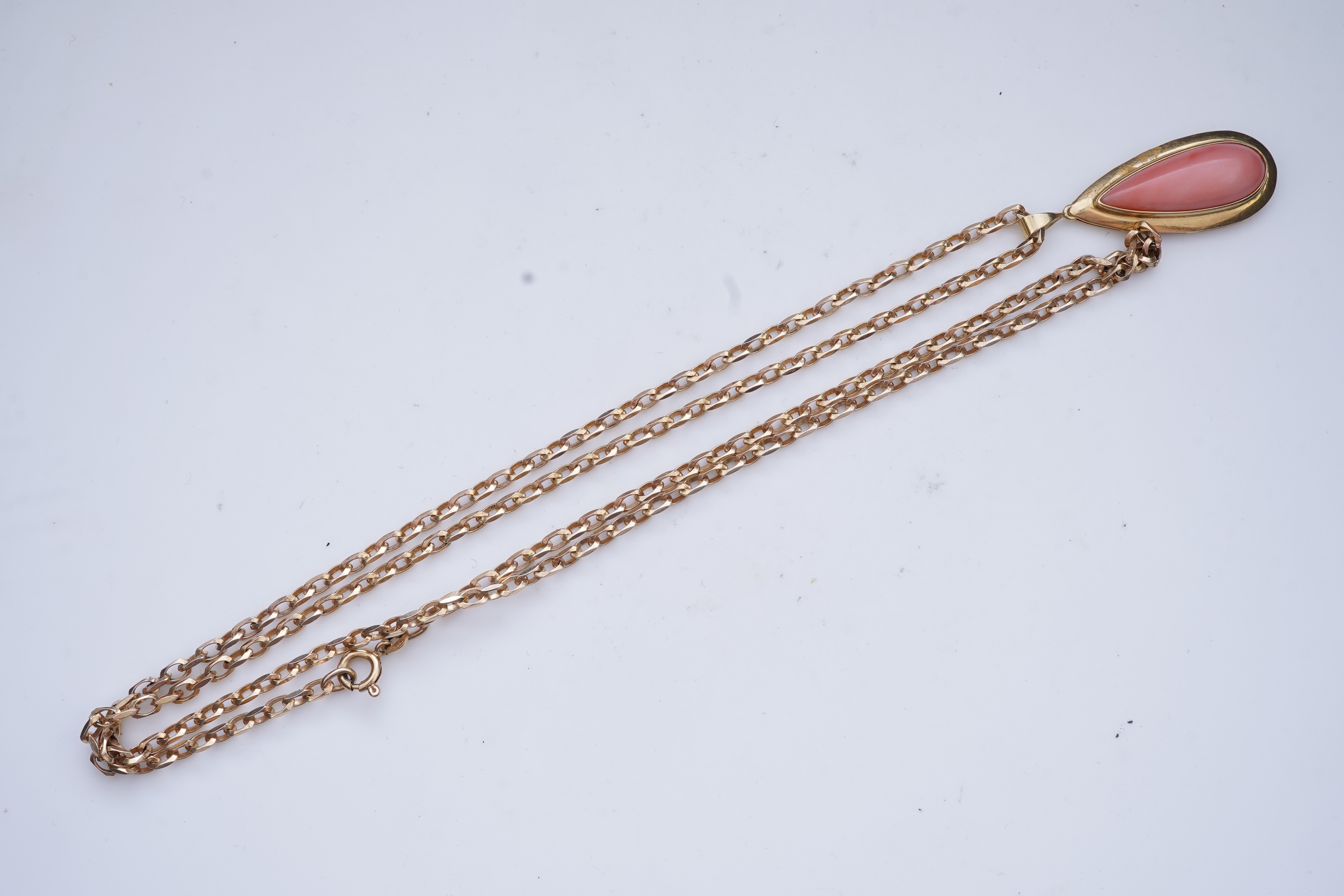 A coral pendant necklace